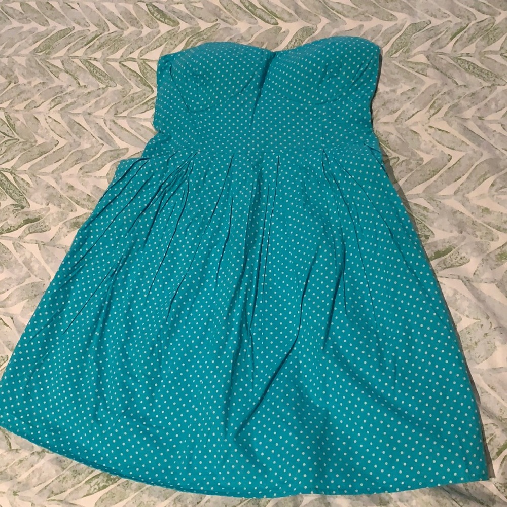 Blue and white polka dot strapless dress